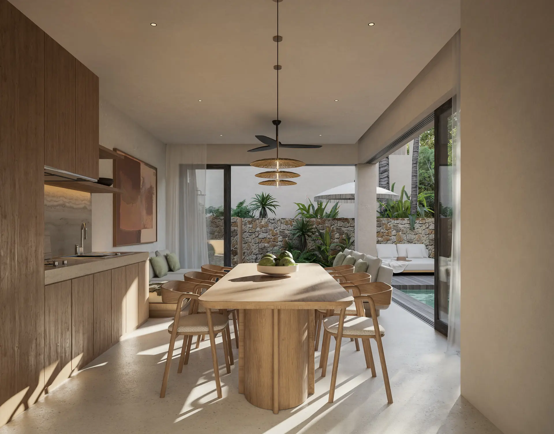 Kitchen and dining area opening to the private pool